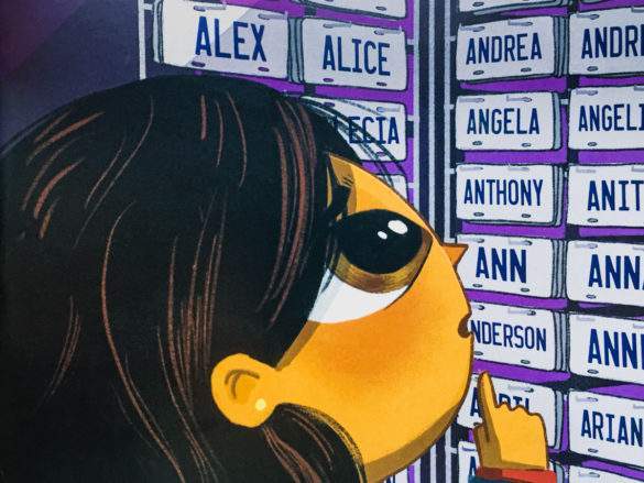 Asian Indian girl looks at white names