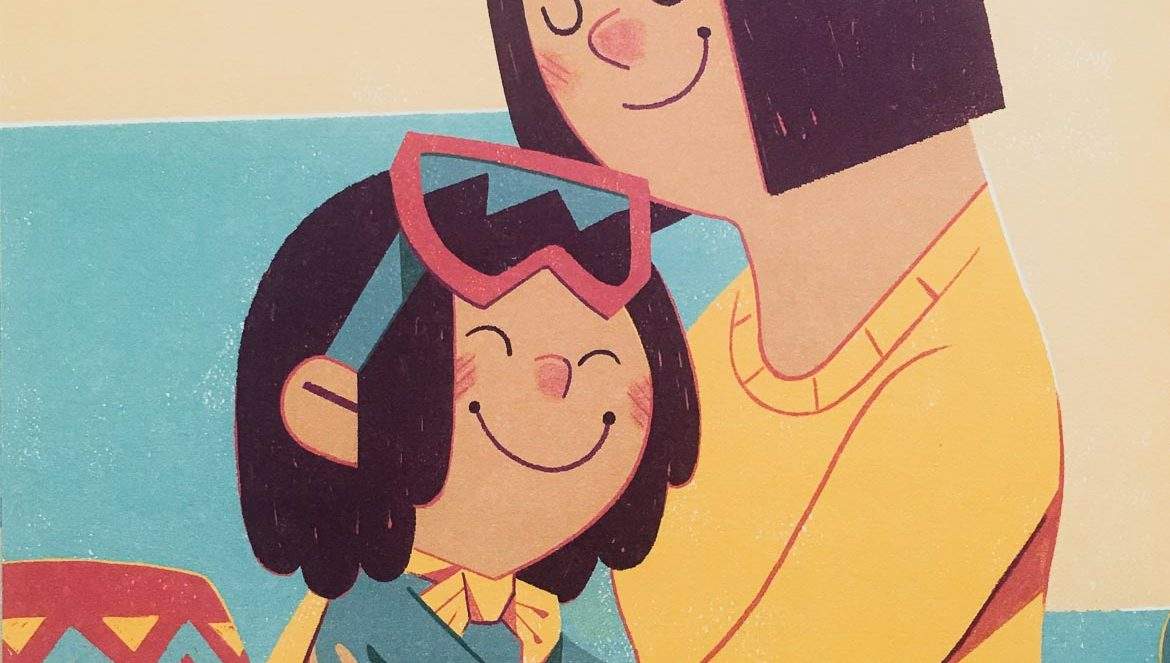 Little Nunavut girl with dark hair and goggles, snuggling with her mother