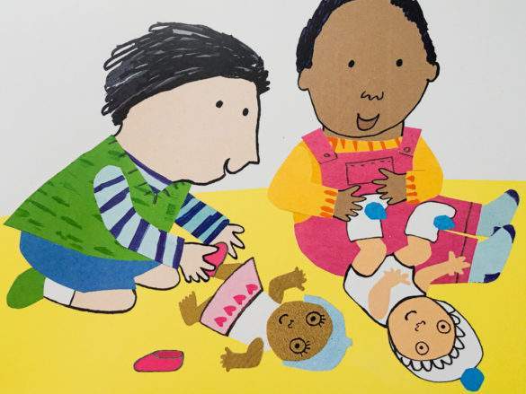 boys caring for baby dolls