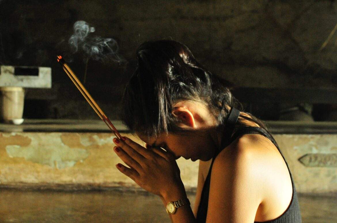 bowing with joss sticks