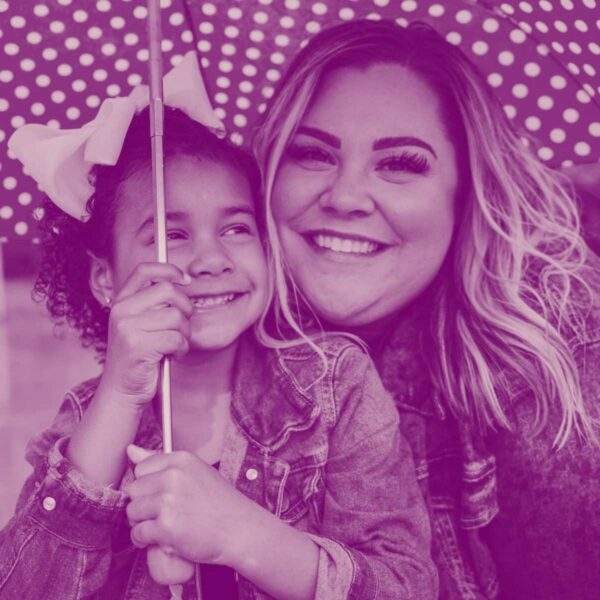 april family action toolkit mother & child smiling under umbrella