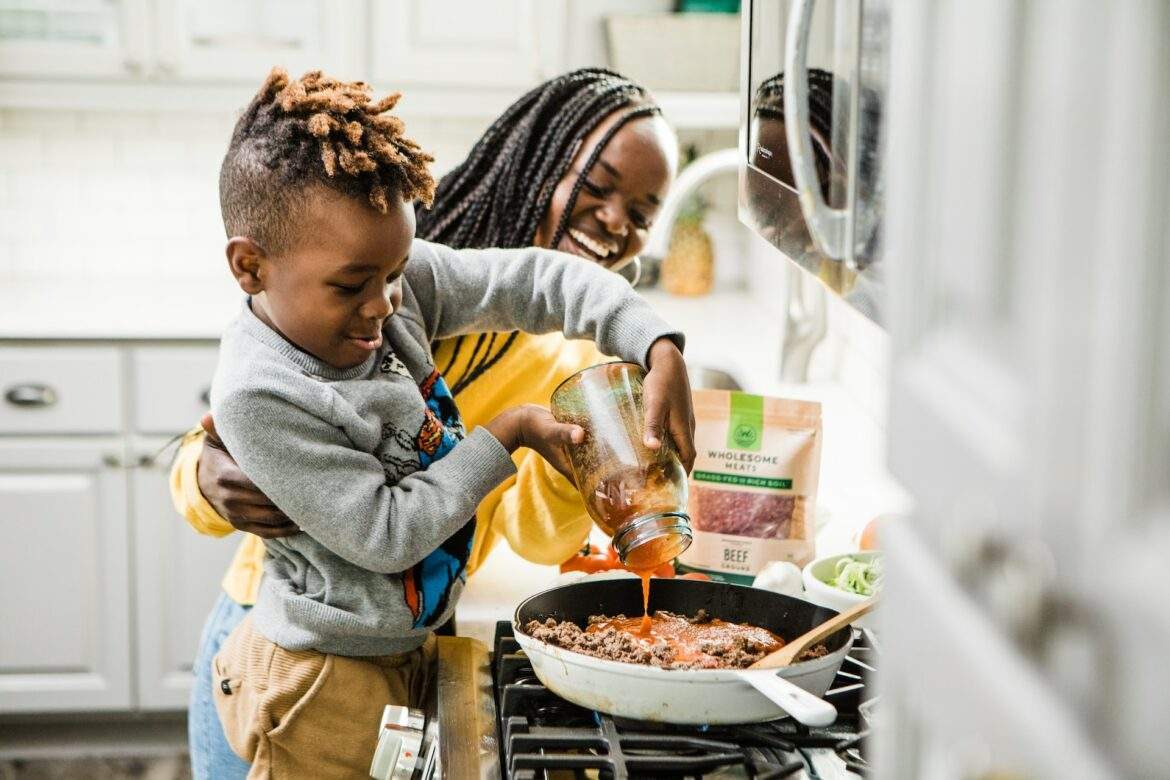 mother and child cook dinner