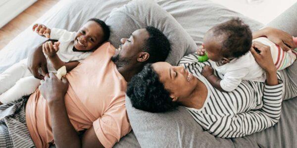 parents and children relax and cuddle
