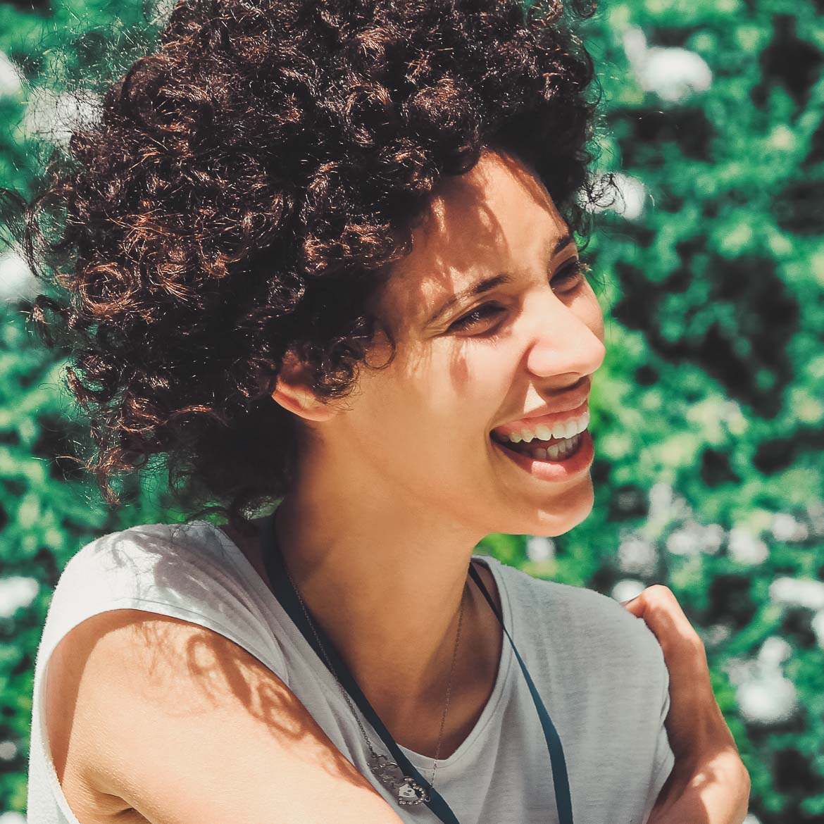 woman laughing outside